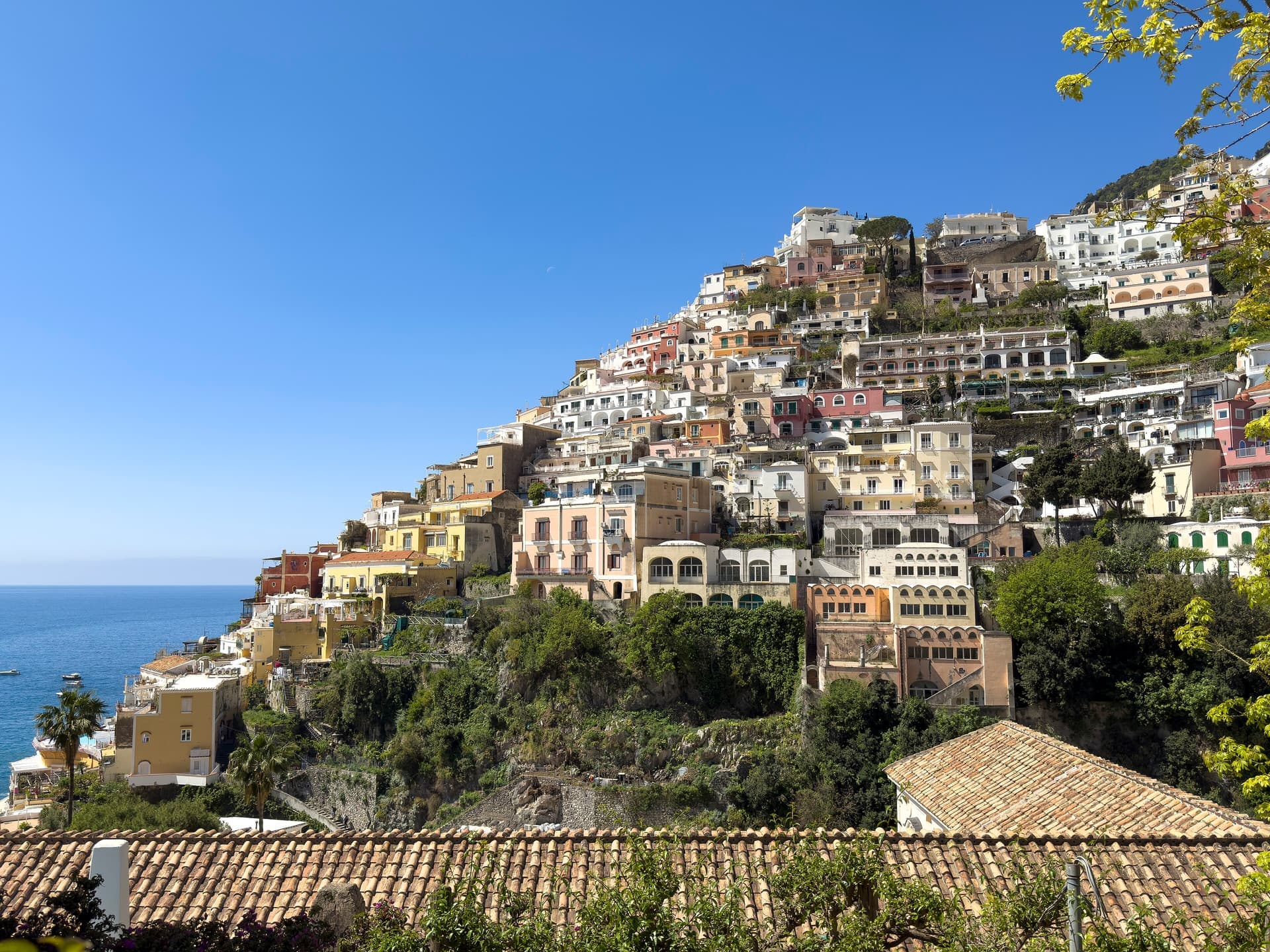View across the rooftops and beach of Positano on the Amalfi Coast