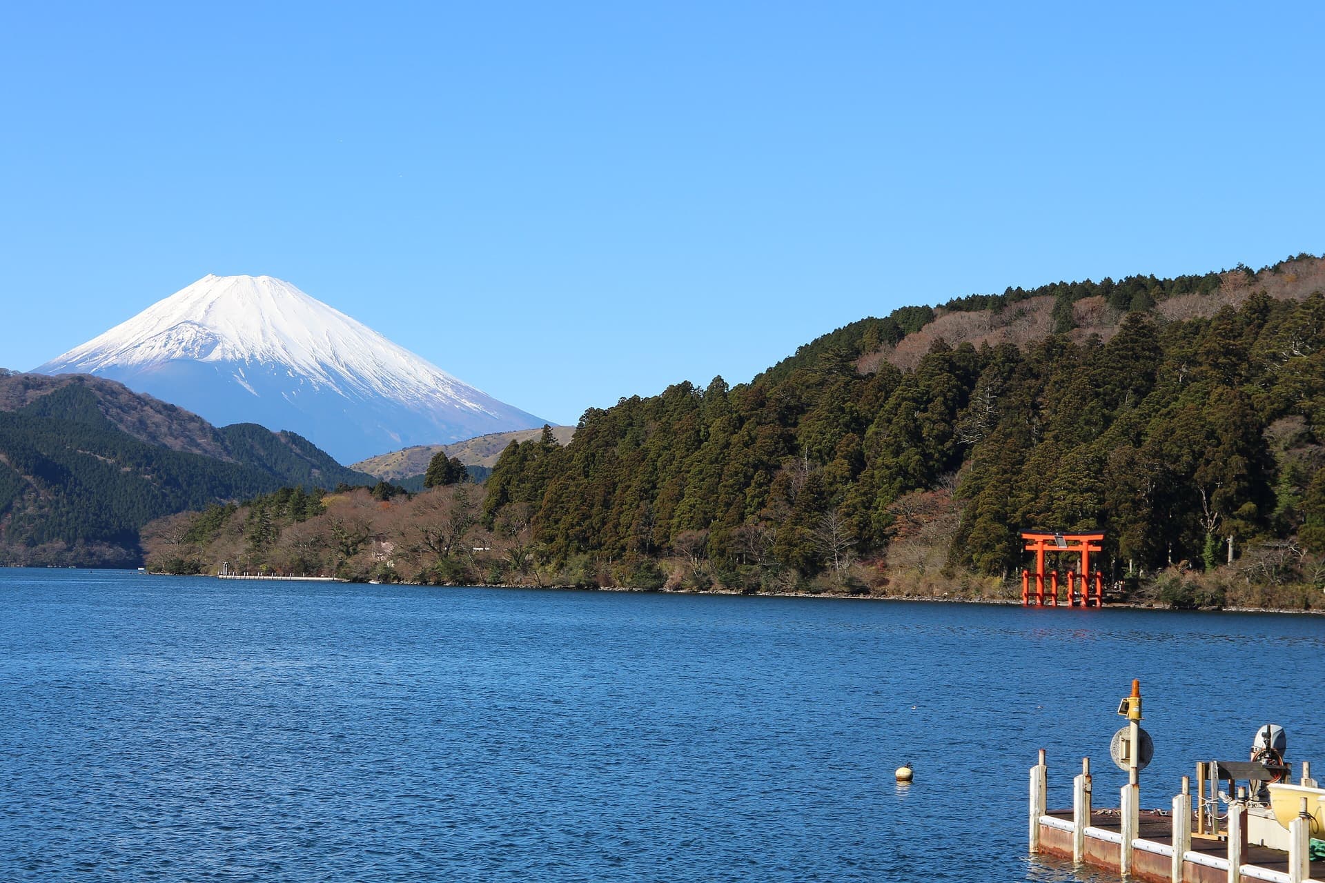 Mount Fuji rising above the still water of Lake Ashi in Hakone